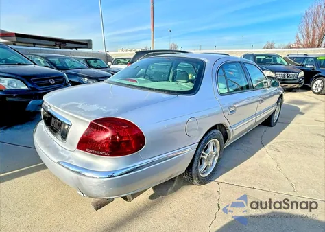 2001 Lincoln Continental z USA, uszkodzony, nr VIN 1LNHM97V71Y604107